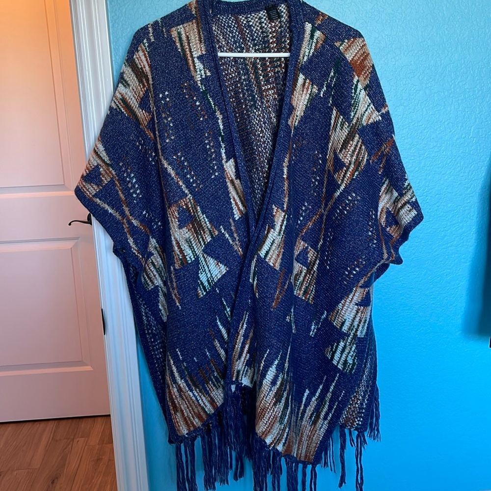 Poncho sweater from boot barn. One size fits all.
